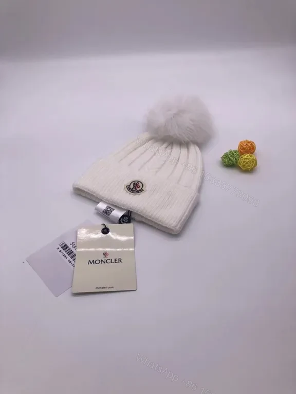 View 3 of Chic Black Moncler Knit Beanie â€” Plush Pom, Luxe Warmth
