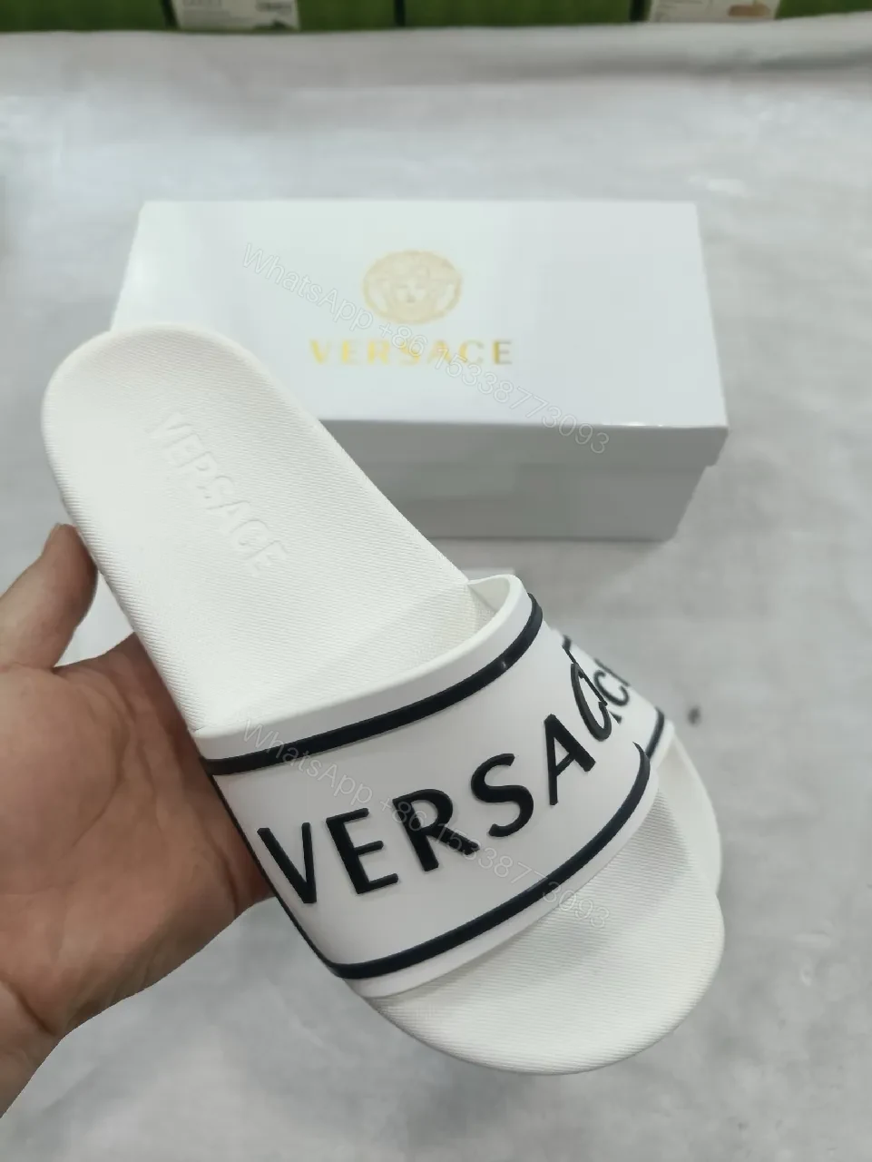 View 9 of White Leather Slide with Bold Brand Stripe, Unisex Comfort