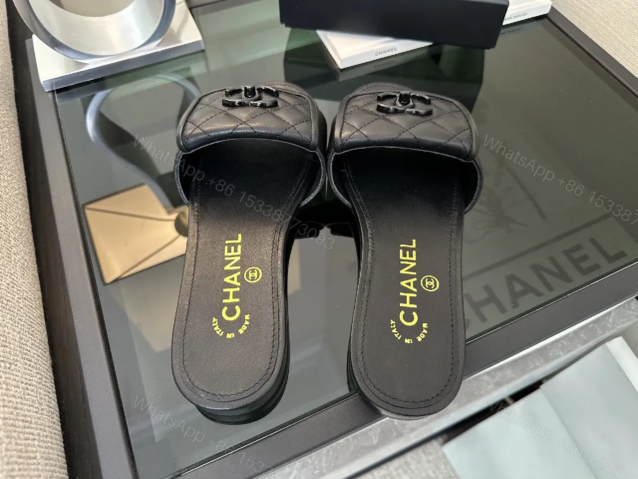 View 4 of Chic Black Quilted Slides with Logo Detailing