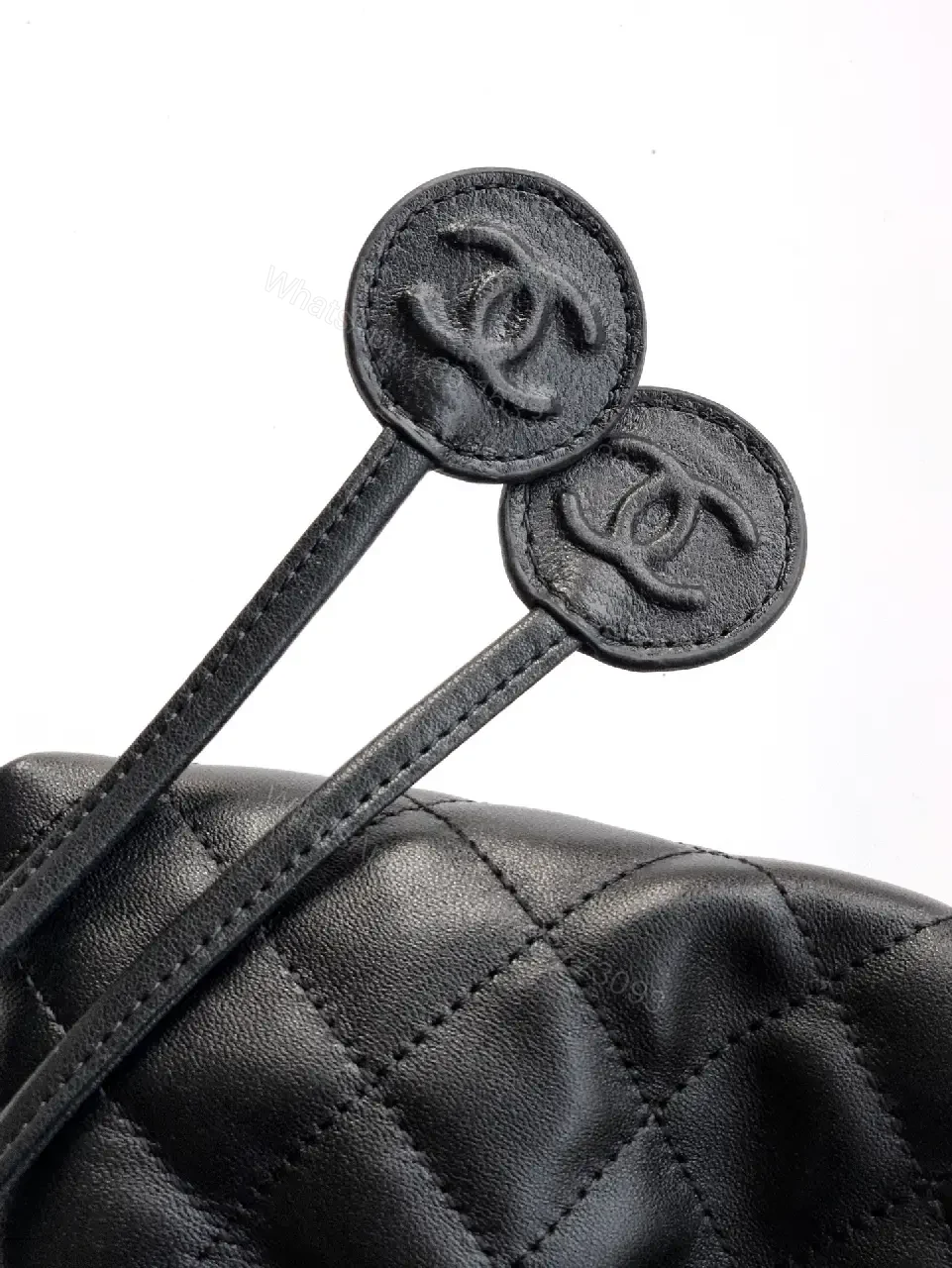 View 6 of Quilted Drawstring Bag - Black Leather-Feel, Gold Accent