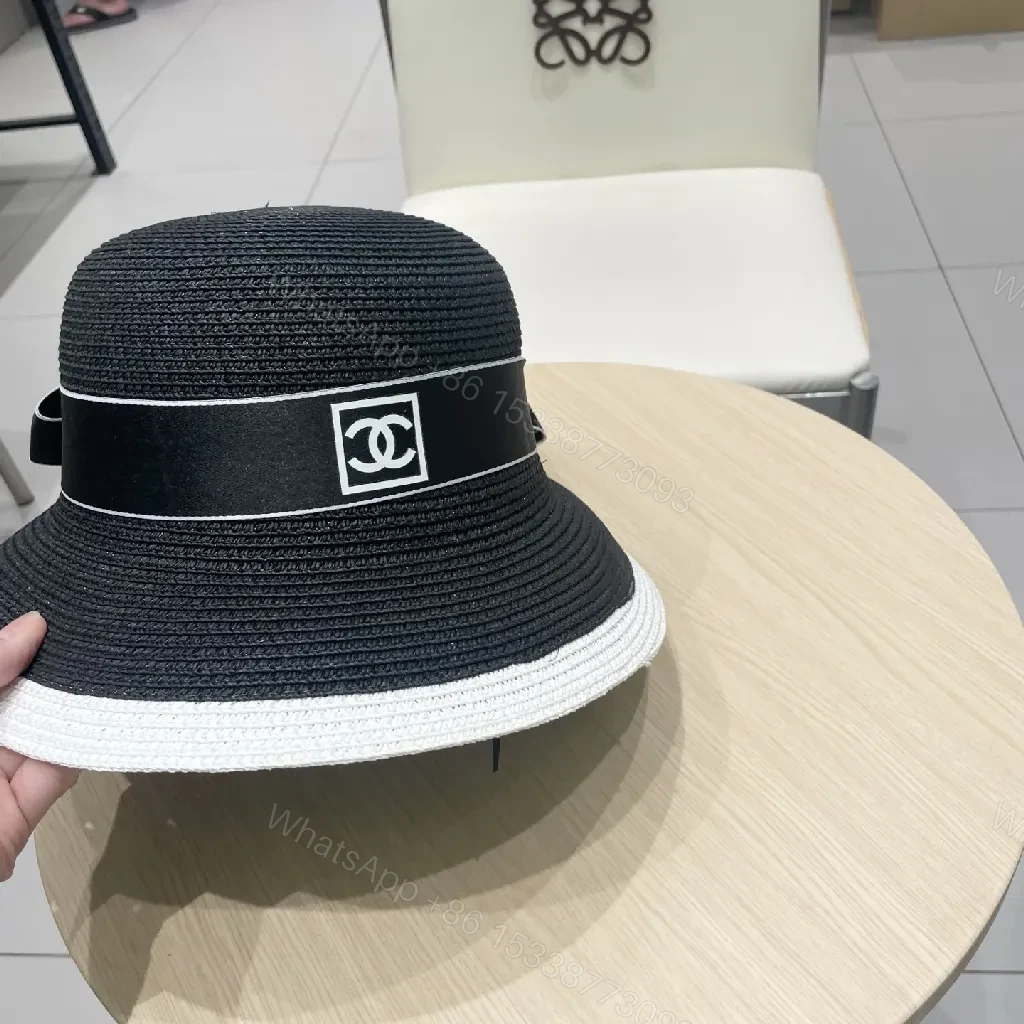 View 2 of Black-White Straw Hat with Ribbon Flower Accent - Sun Ready Couture-style Hat