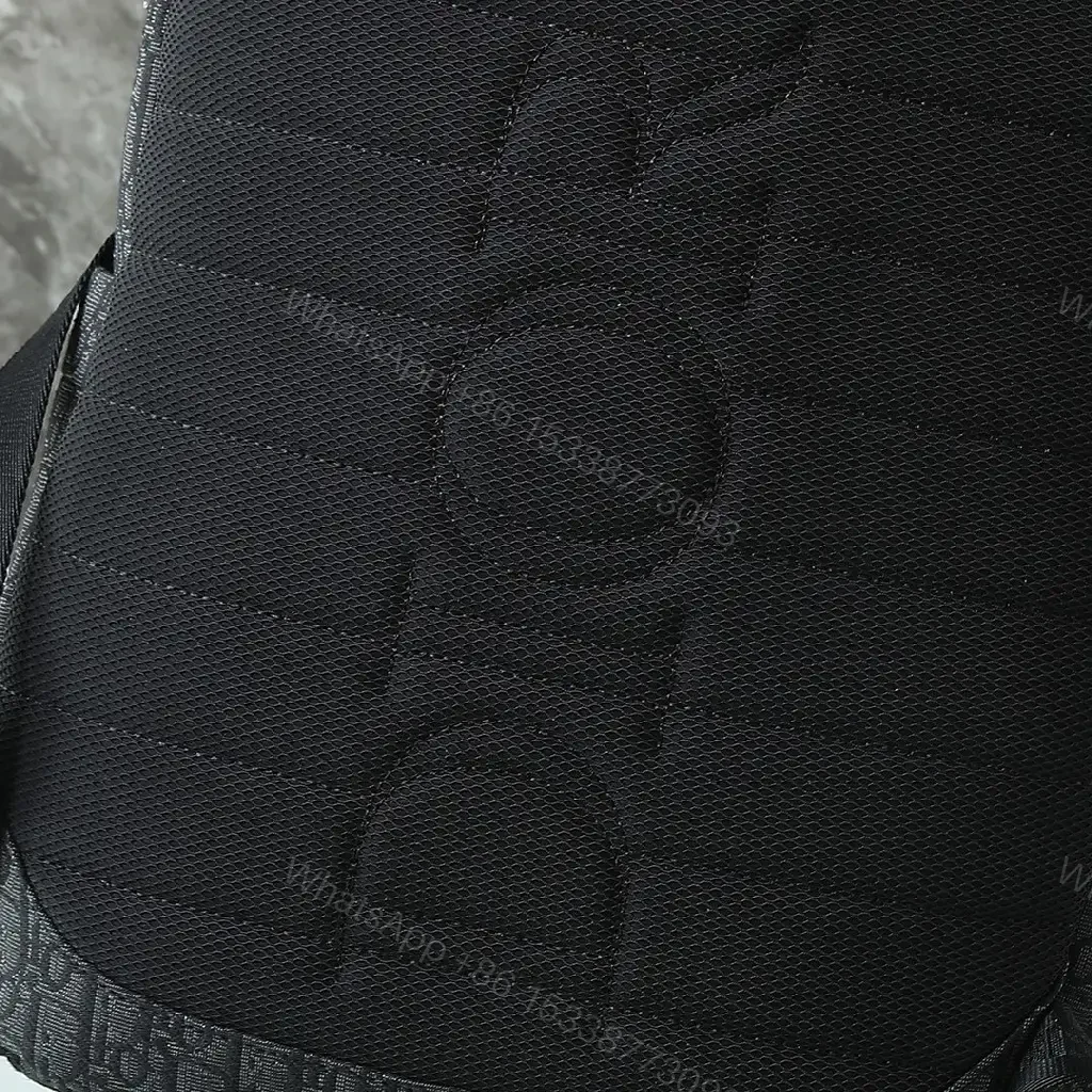 View 4 of Monogram Texture Compact Luxury Backpack - Day-to-Night Utility