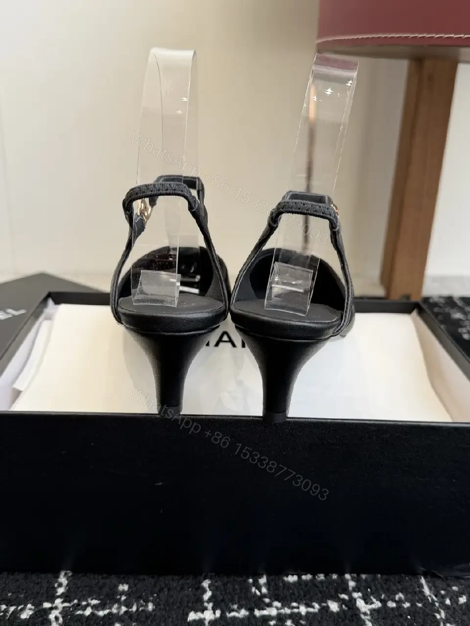 View 10 of Black White Leather Slingback Heels with Chanel Logo, Pointed Toe, 2-inch Heel