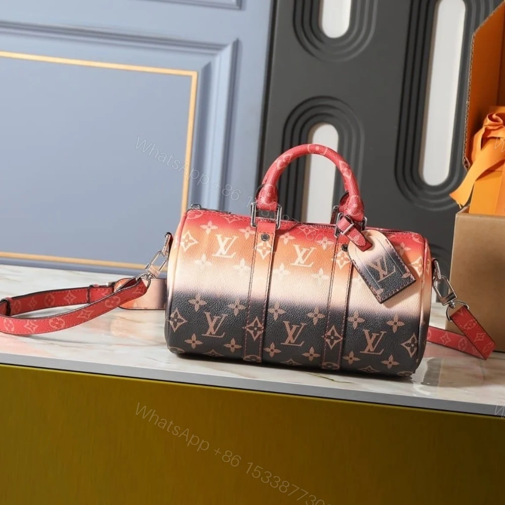 View 2 of Louis Vuitton Keepall Bandoulière 25 Orange 25Cm M28074
