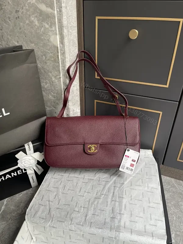 Burgundy Textured Leather Shoulder Bag: Compact Luxury — view 1