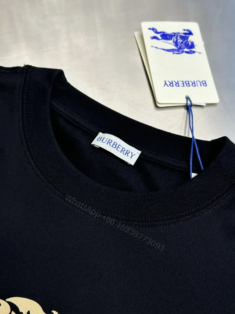 View 7 of Black Heavyweight Cotton Graphic Tee, Relaxed Fit, Bold Crest