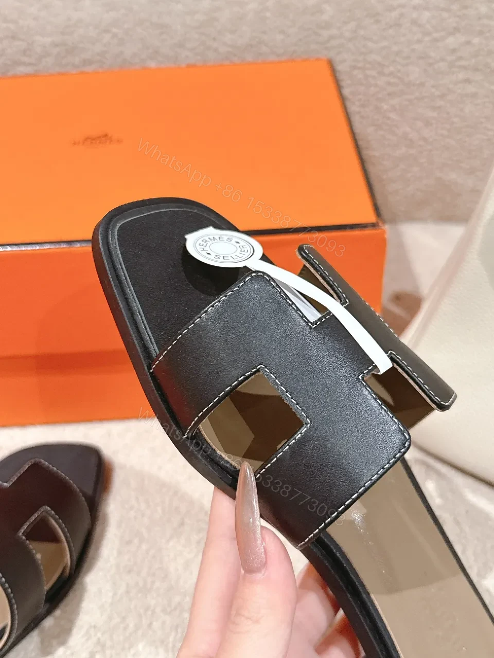 View 8 of Patterned Stride Sandals in Black Leather – Luxury Flat Slides