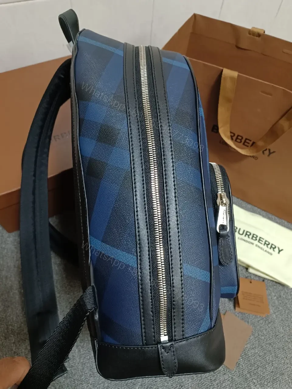 View 8 of Bold Check Pattern Leather-Accented Backpack for Everyday Luxury