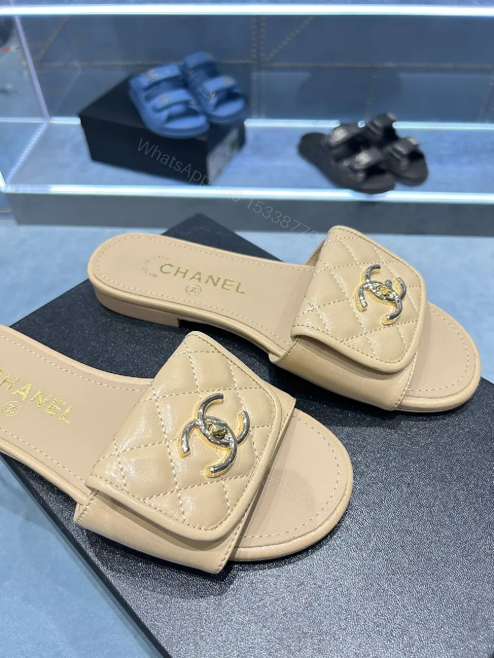 View 9 of Beige Quilted Leather Slide Sandals with Logo Detailing