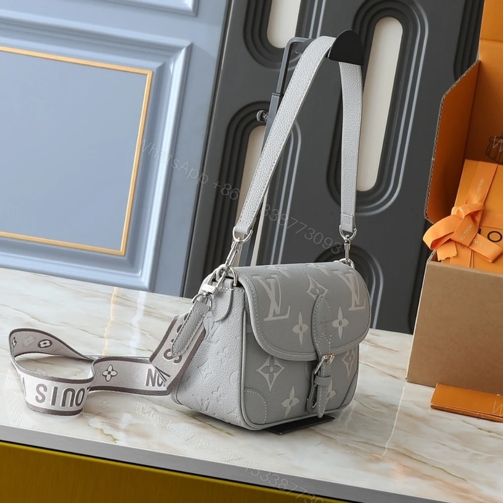 View 3 of LOUIS VUITTON DIANE MONOGRAM EMPREINTE BRUME AND QUARTZ 25CM M14214