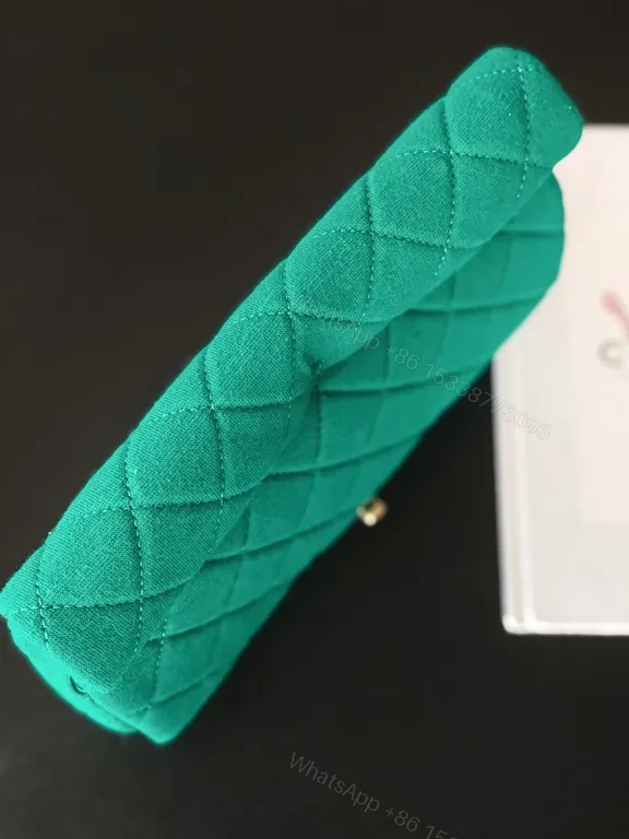View 2 of Emerald Quilted Purse: Gold-Closure, Structured Luxe Bag