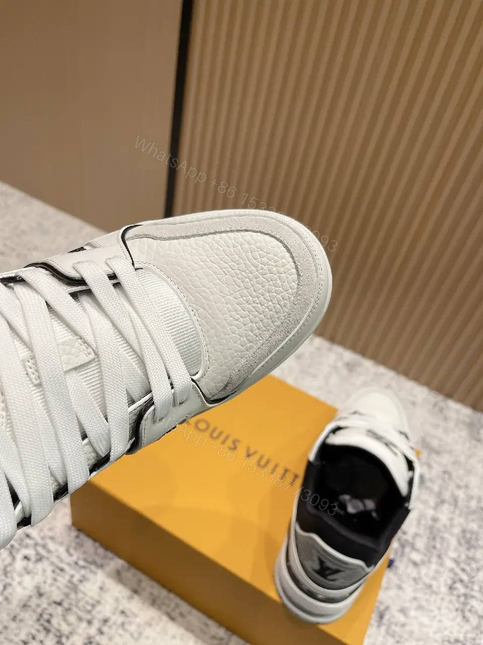 View 6 of White Leather Runner Sneakers with LV Detailing