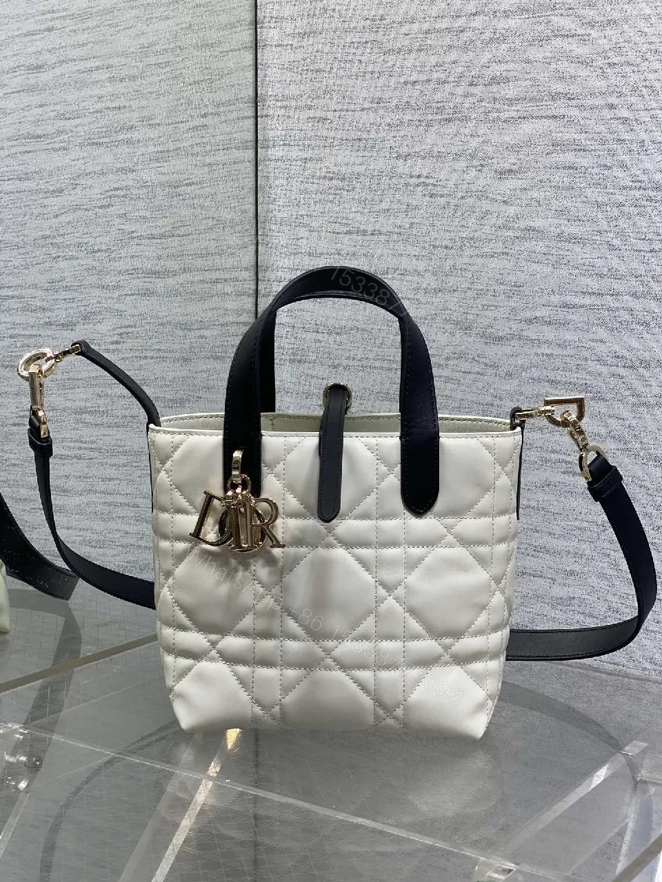 View 4 of Quilted Mini Handbag with Gold Charm - Compact Luxury Bag
