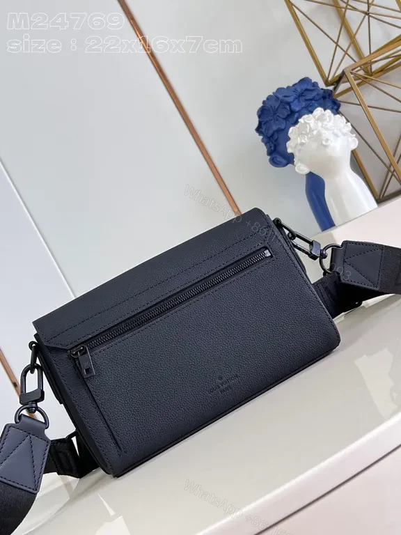 View 2 of Chic Compact Messenger: Luxury Leather, Subtle LV Emblem