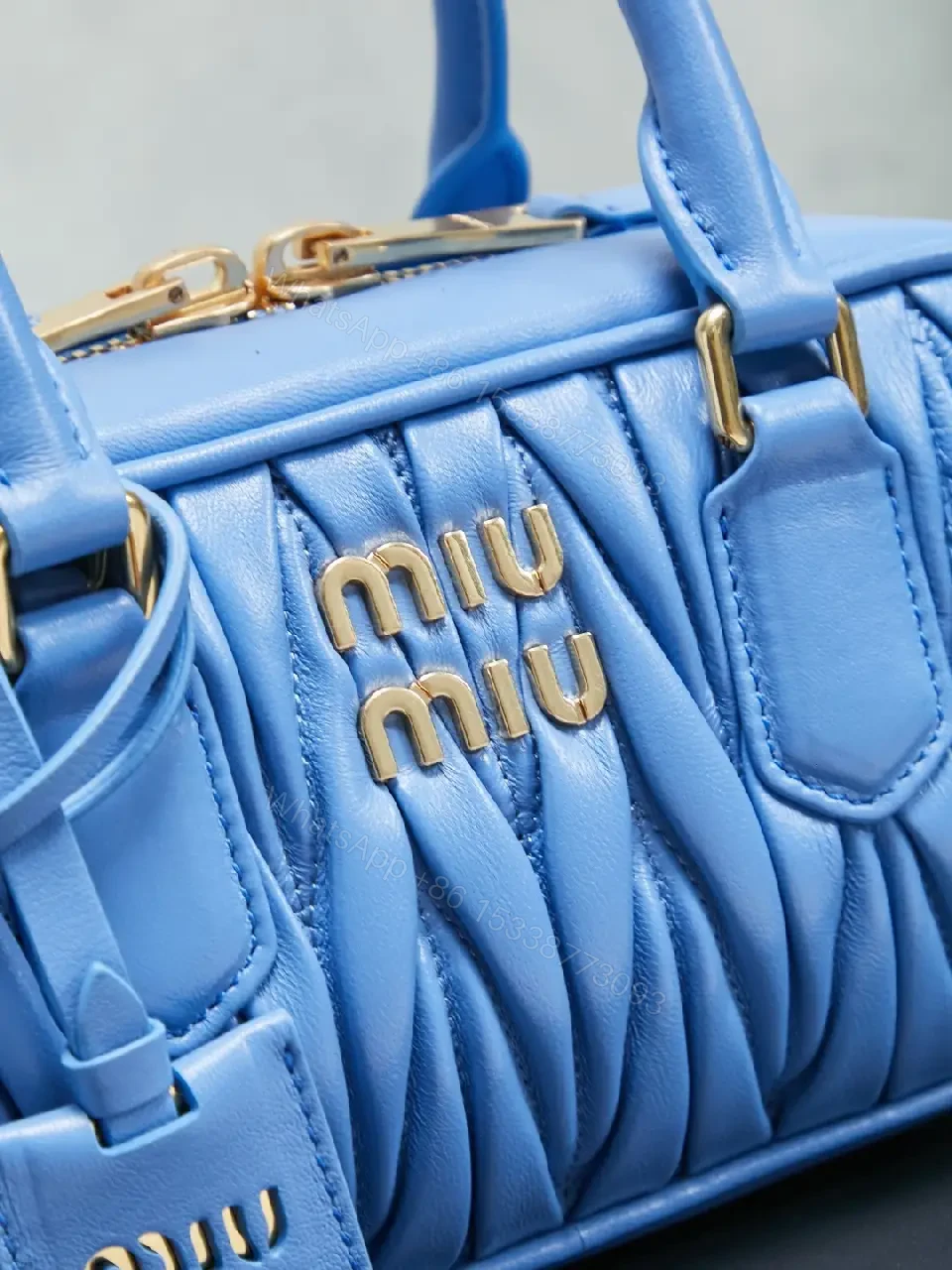 View 5 of Bright Blue Quilted Structured Satchel with Top Handles Analogous to Miu Miu-style Gold Hardware Bag