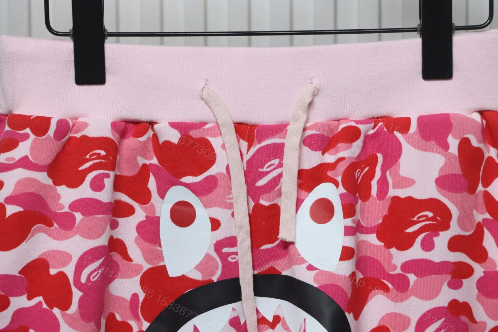 View 2 of Bape Camo Shark Shorts Pink