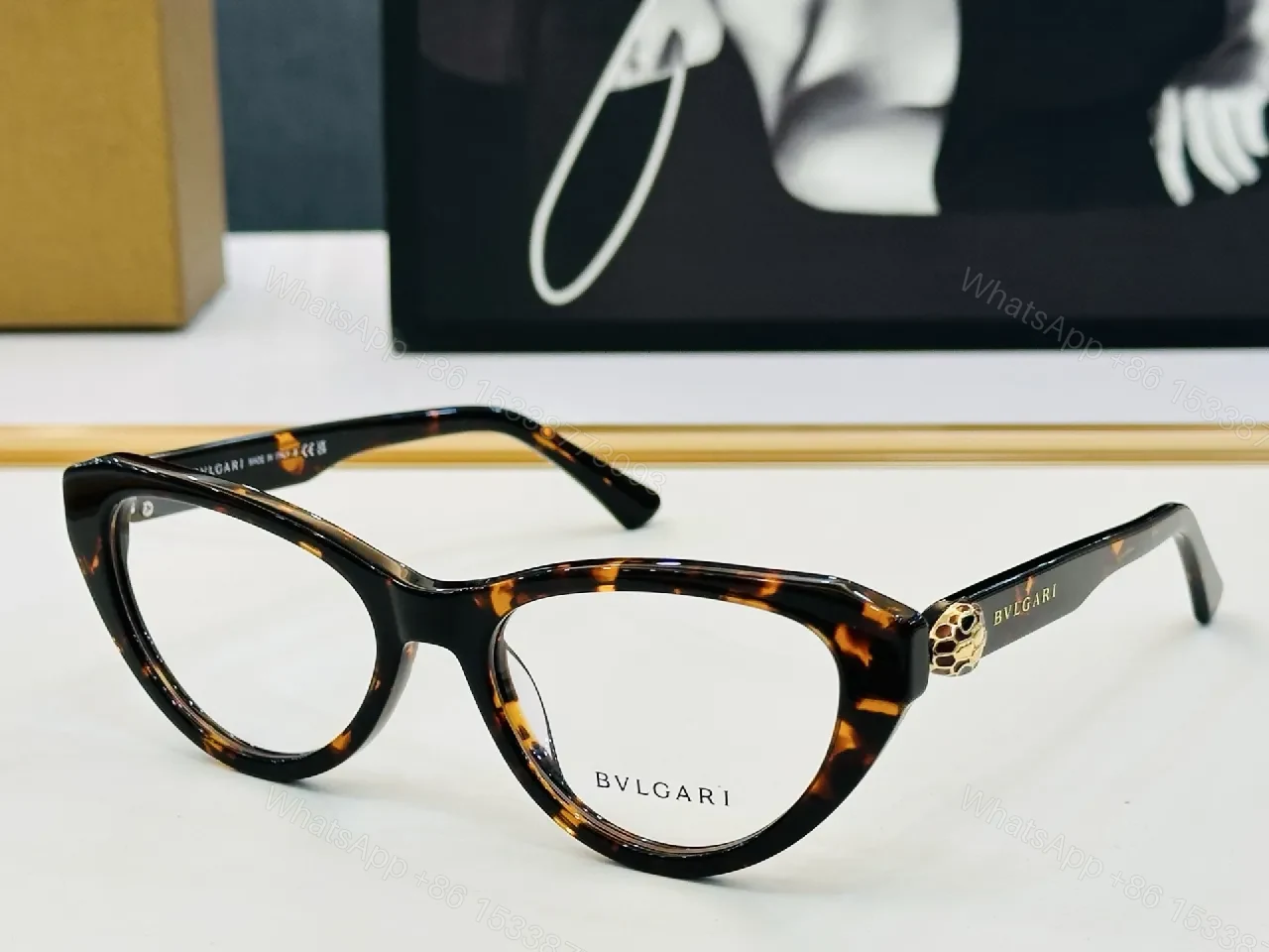 View 9 of Bold Cat-Eye Black Frames with Gold-Accent Sunglasses