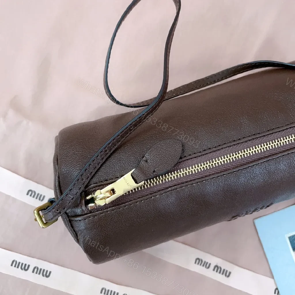 View 9 of Compact Luxury Leather Bag with Subtle Embossing