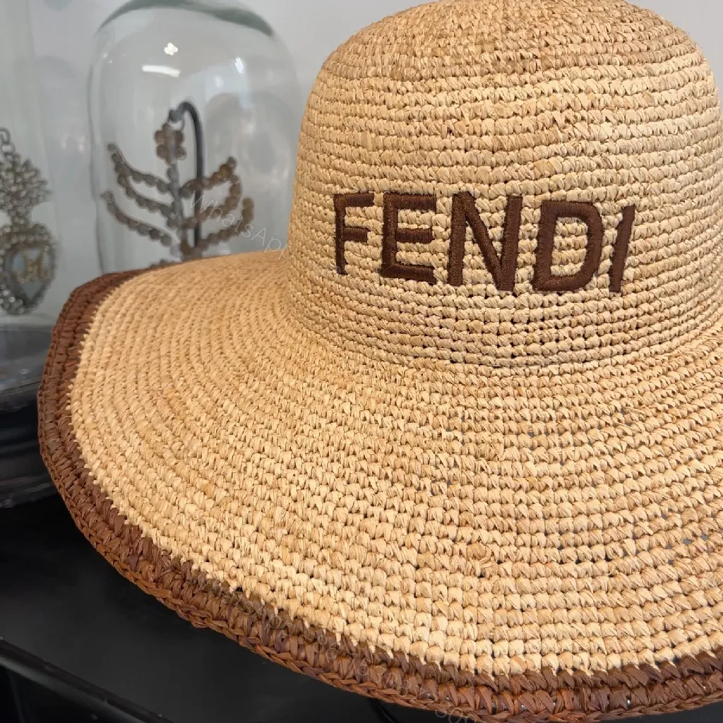 View 3 of Wide-Brim Straw Knit Hat: Bold Couture-Ready Sun Shield