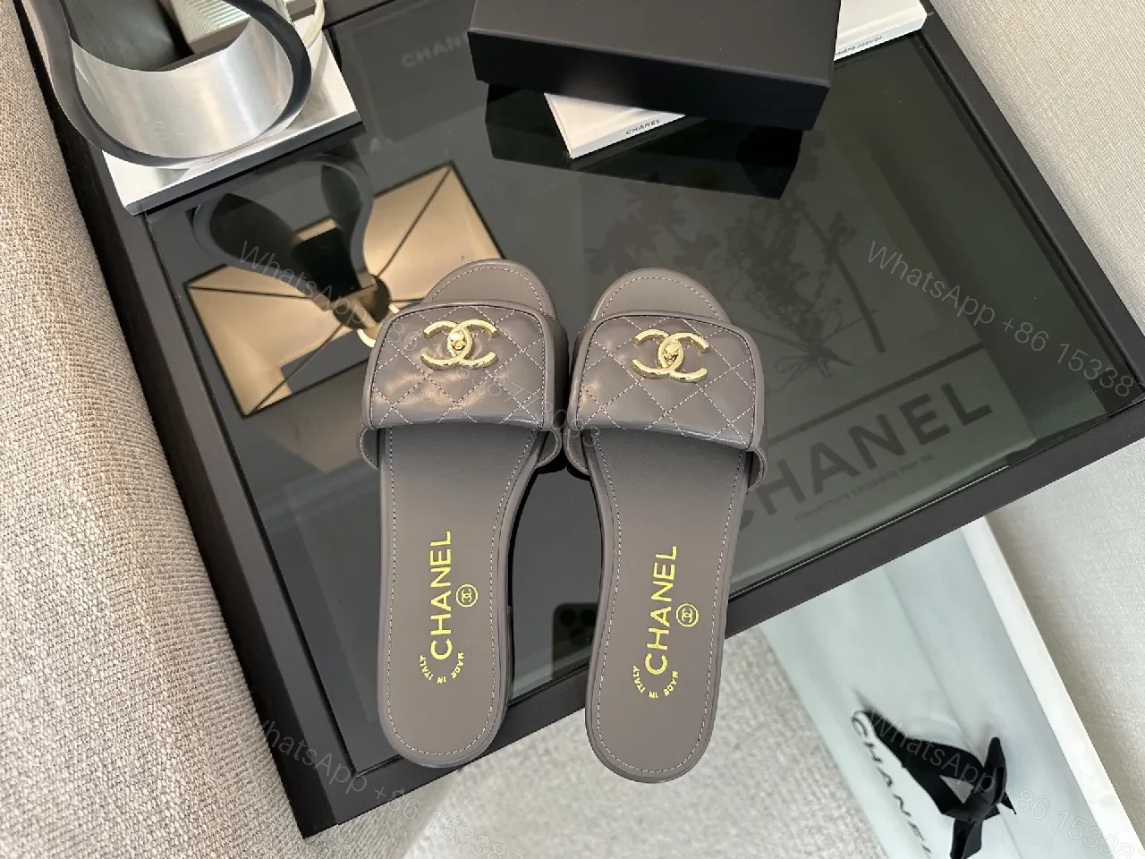 View 8 of Quilted Leather Slides with Gold Logo – Luxe Comfort