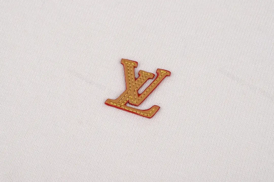 View 5 of White Jersey Short-Sleeve Crewneck T-Shirt with Gold LV Chest Logo