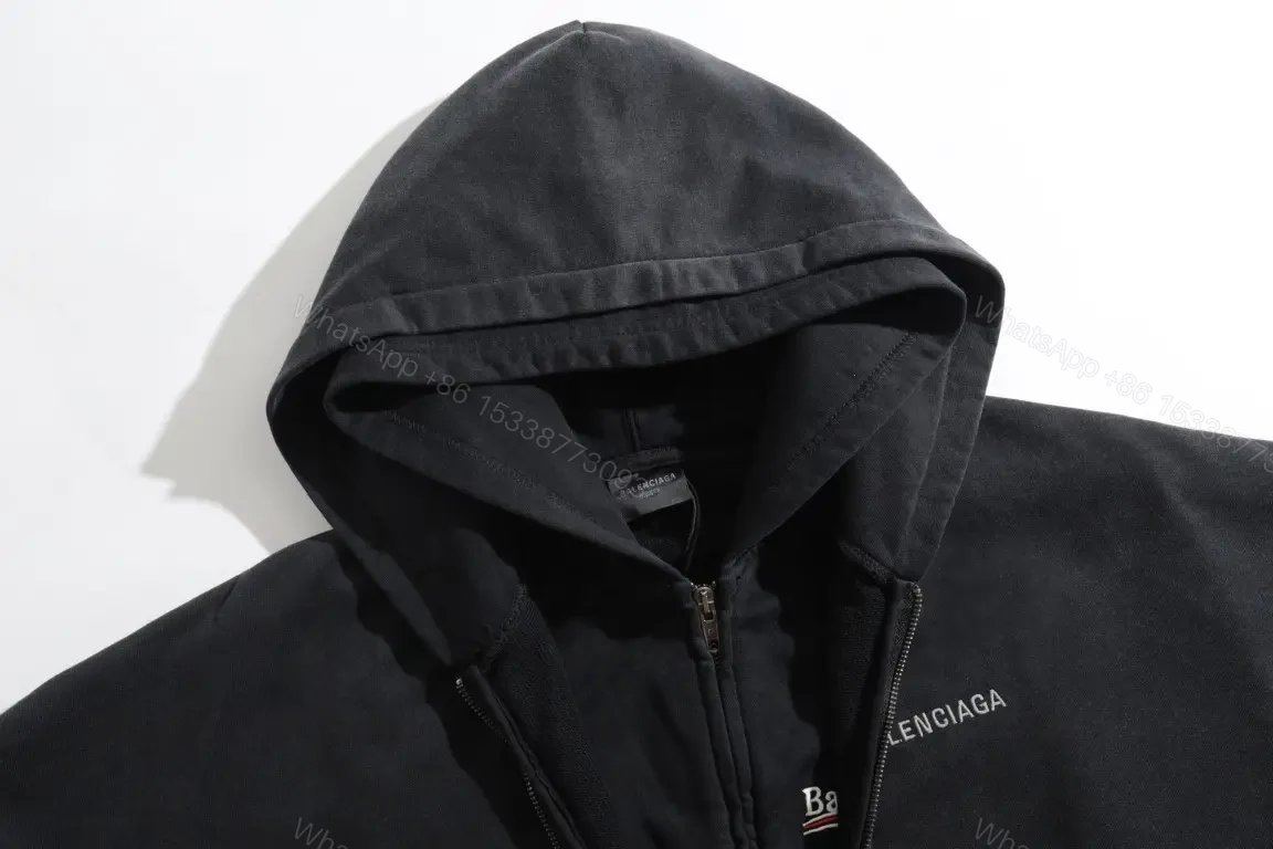 View 2 of Black Zip Hoodie Jacket: Minimalist, All-Season Layering, Durable