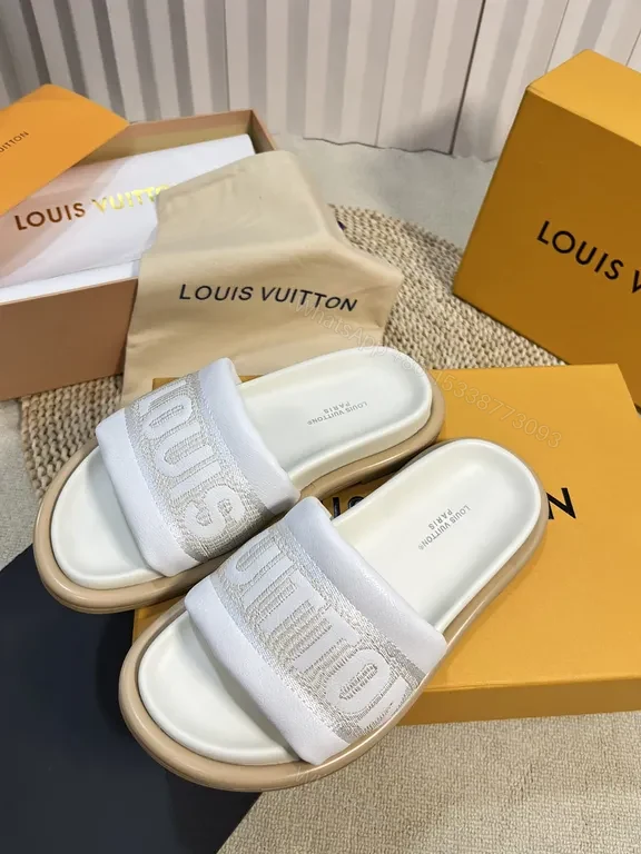 View 9 of Louis Vuitton Luxe Textured Slides with Logo Embellishment