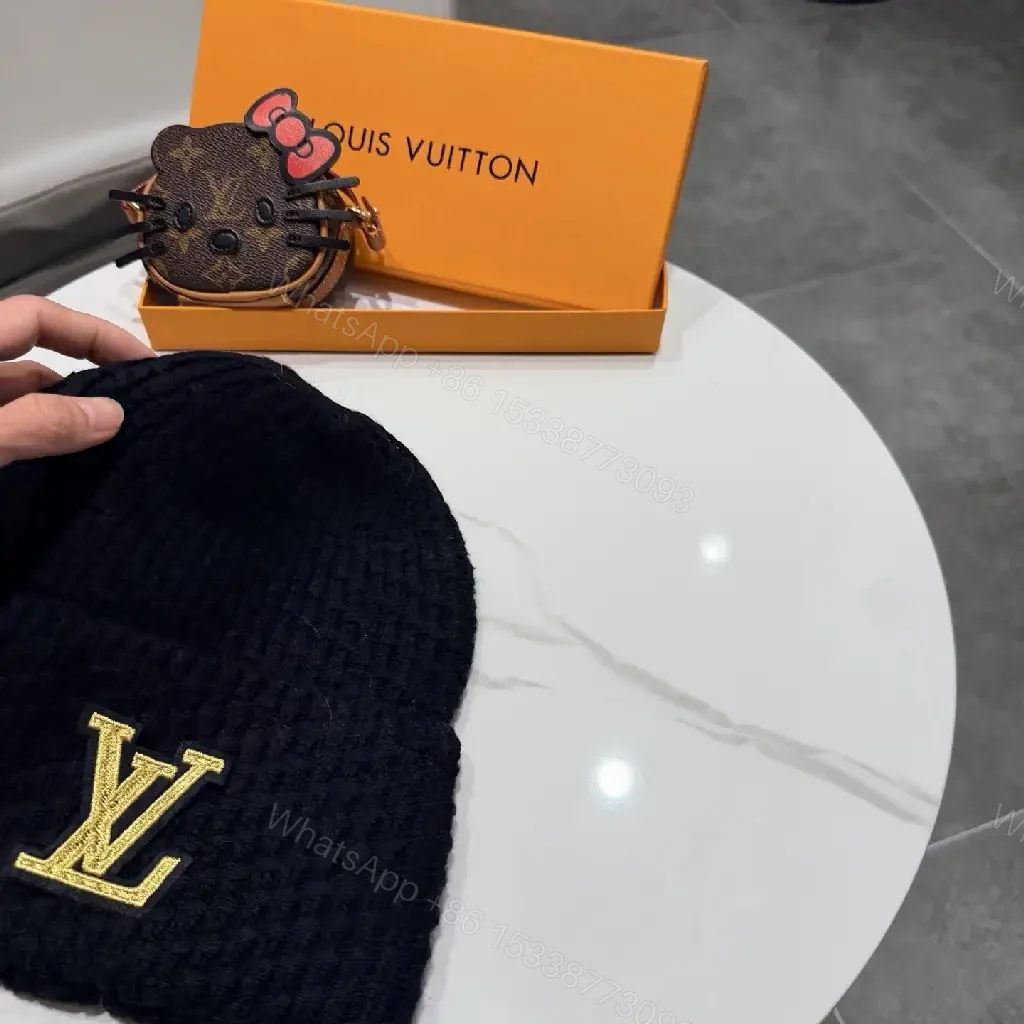 View 5 of Cozy Chic Beanie with Gold LV Emblem — Streetwise Luxury Beanie
