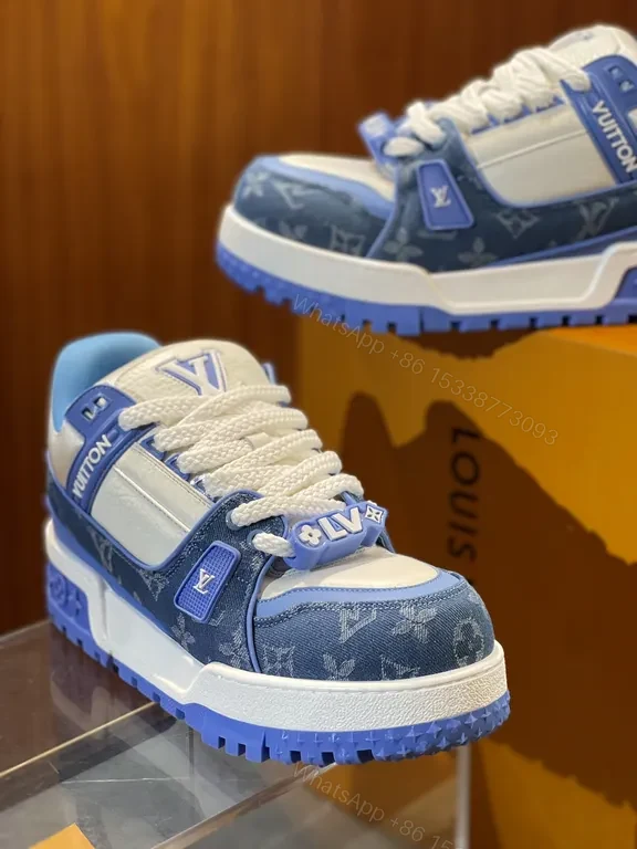 View 3 of Bold Denim-Inspired Trainer with LV Accents - Luxe Casual Sneakers