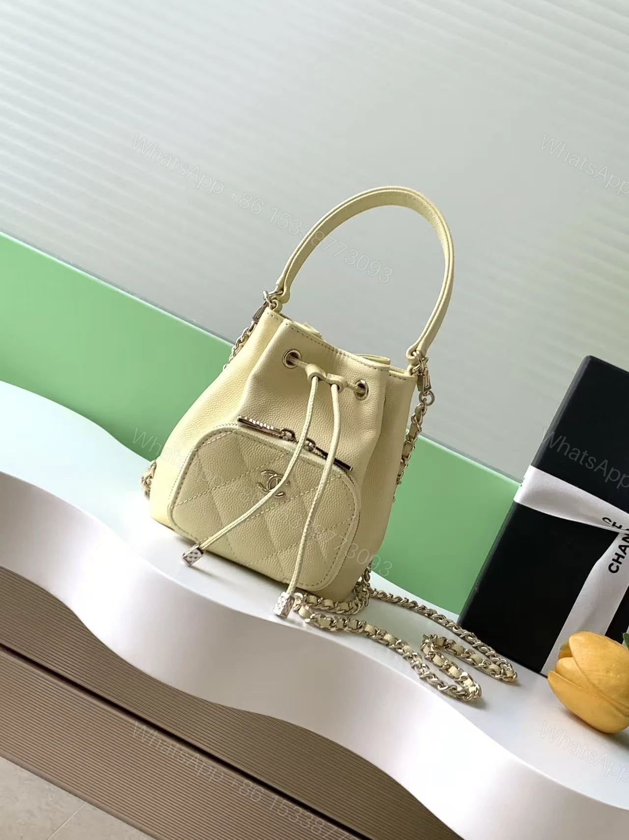 Chanel 高仿女用束口水桶包 杏黃百搭鏈條輕奢款 — view 1