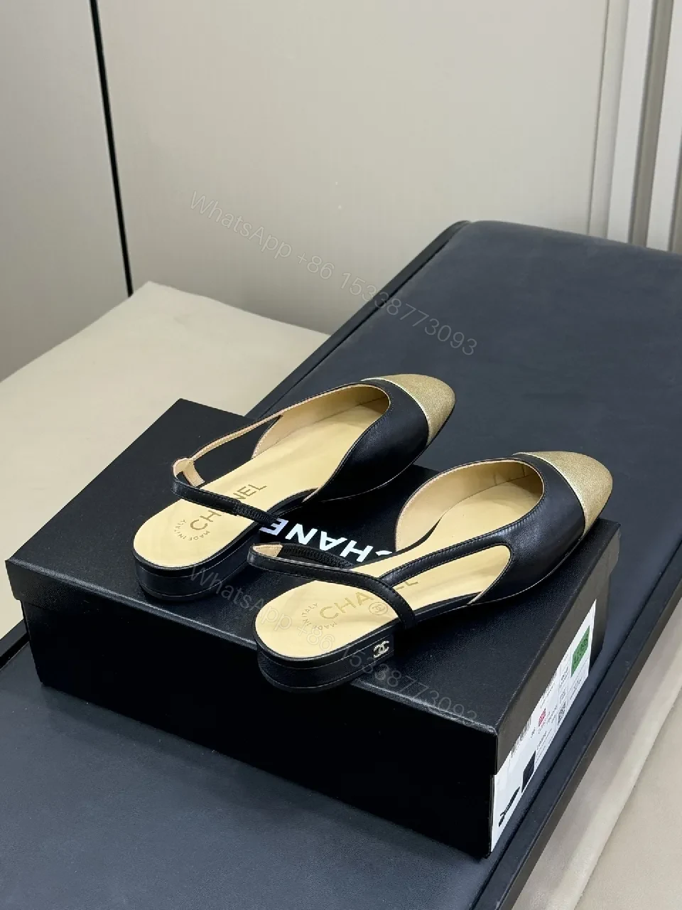 View 4 of Elegant Slingback Pumps: Black Leather with Metallic Cap Toe