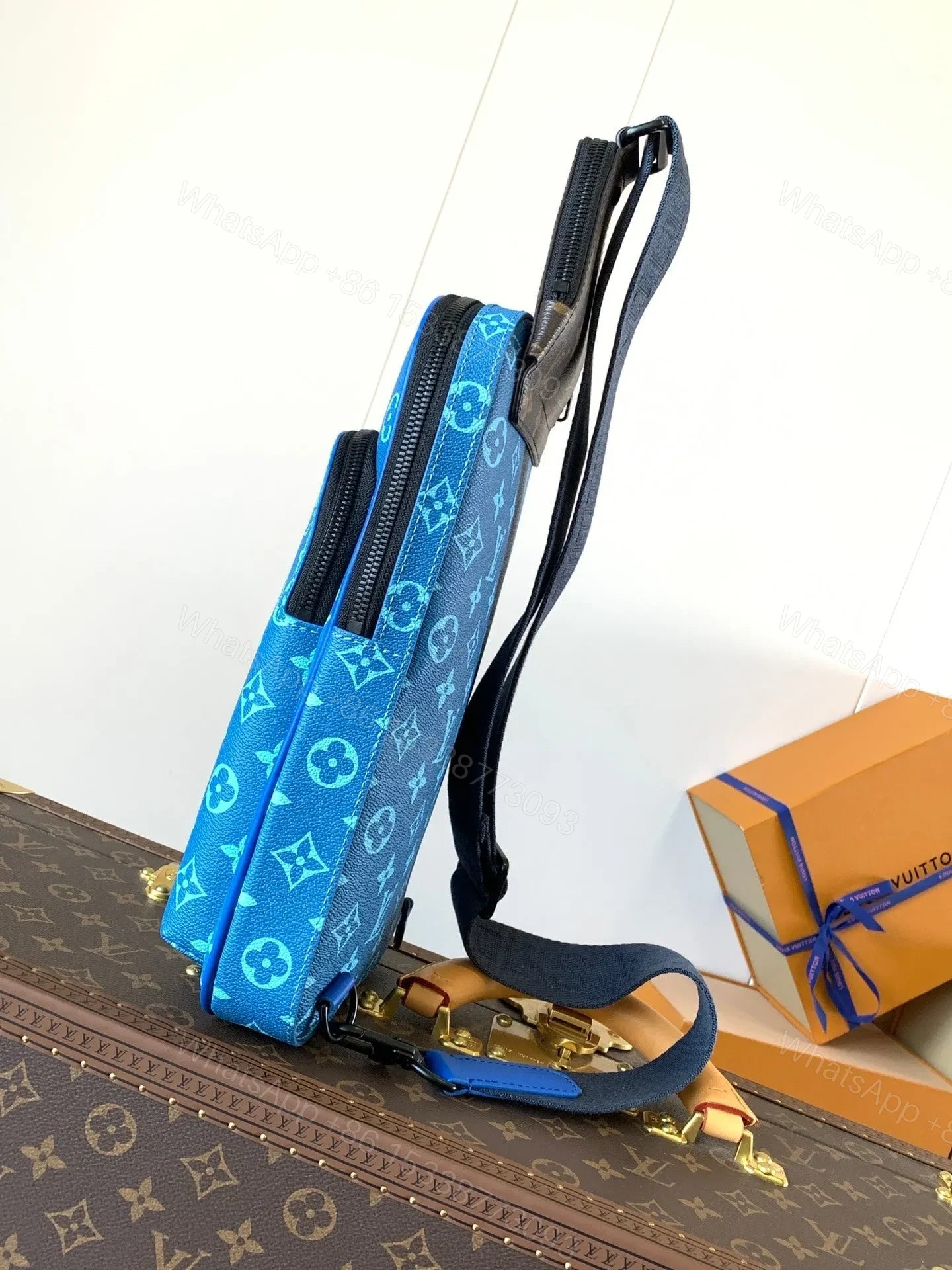 View 4 of LV AVENUE SLINGBAG 31 IN BLUE AND BROWN TAIGA LEATHER