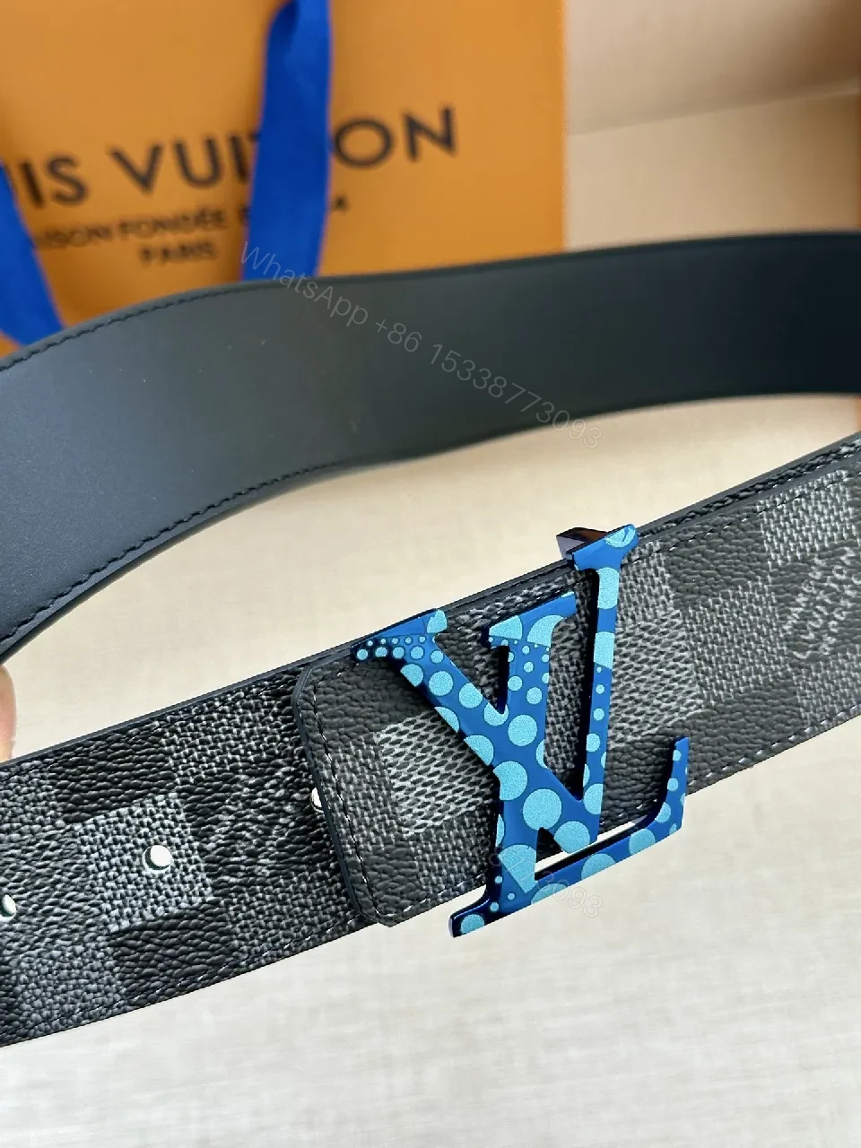 View 3 of Bold Checker Belt with Blue Buckle — Modern Luxury Accessory
