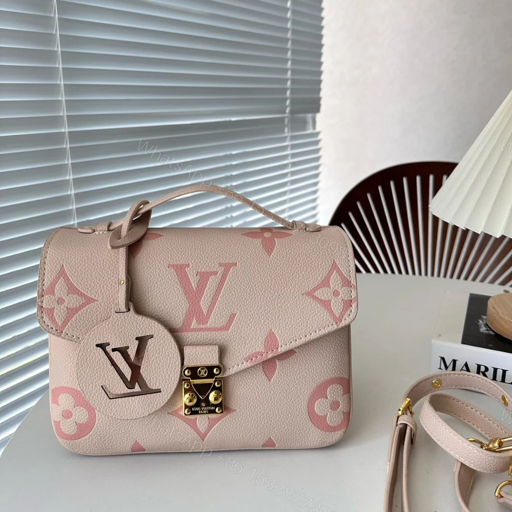View 2 of Louis Vuitton Pochette Métis Pink 25Cm