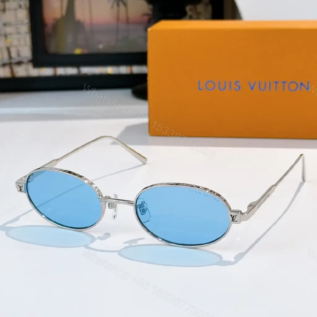 View 7 of Elegant Oval Sunglasses – Silver Metal, Polarized, Luxury Style