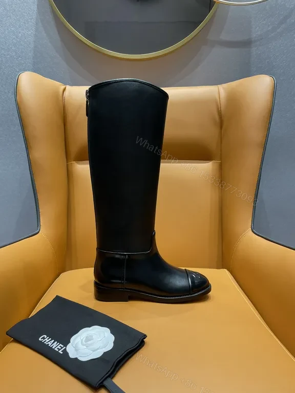 View 4 of Elegant Knee-High Leather Boots - Subtle Luxury Detailing