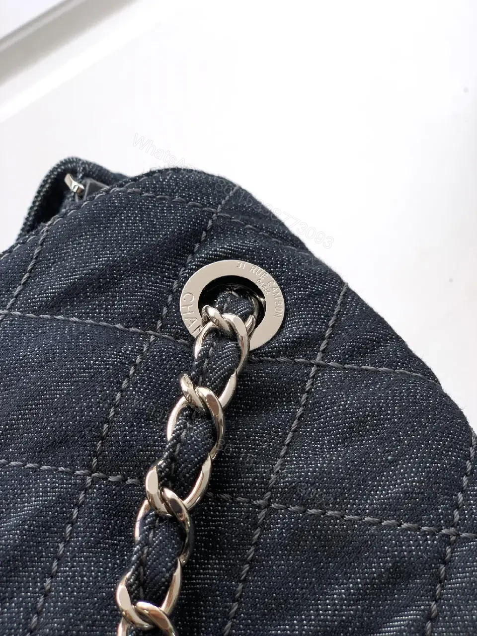 View 3 of Denim Quilted Flap Bag with Signature Chain Closure