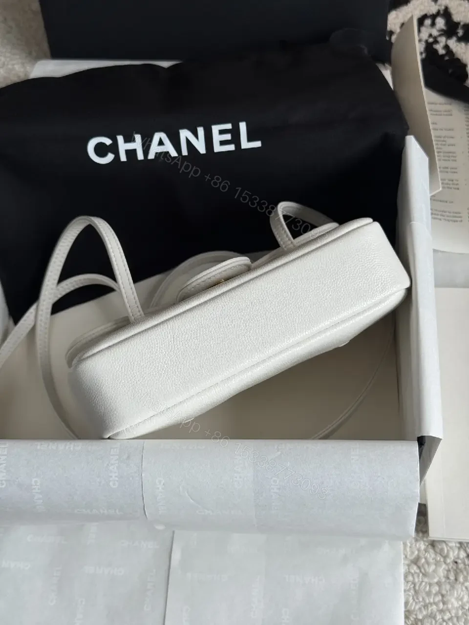 View 2 of White Pebbled Leather Crossbody Bag - Compact Structured Flap with CC Clasp