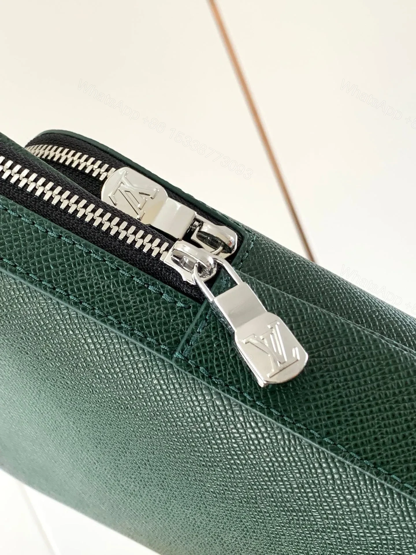 View 8 of LV AVENUE SLINGBAG 31 IN DARK GREEN TAIGA LEATHER