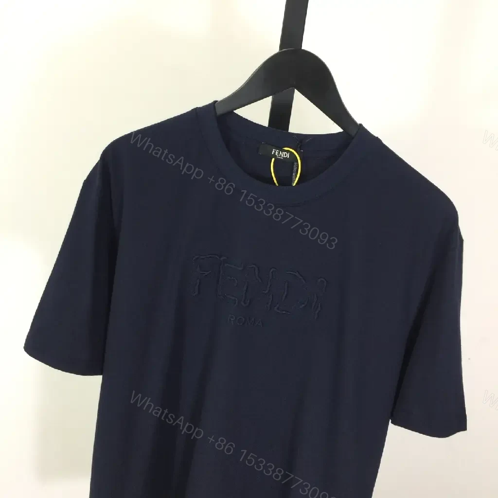 View 9 of Navy Cotton Blend Tee: Subtle Logo, Relaxed Fit, Versatile