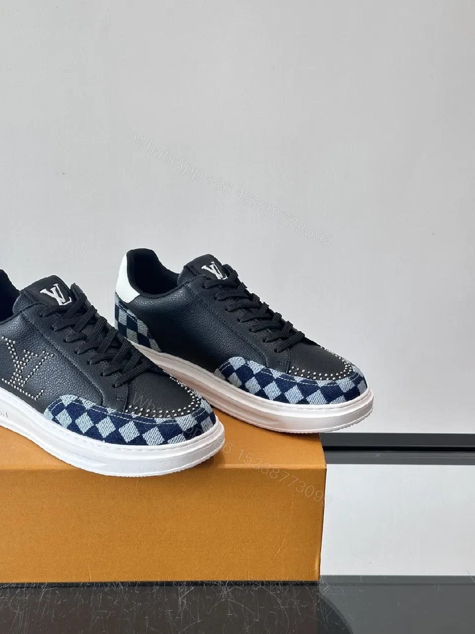 View 3 of Bold Checkerboard Tech Trainers, Leather Panels, LV Motif Sneakers