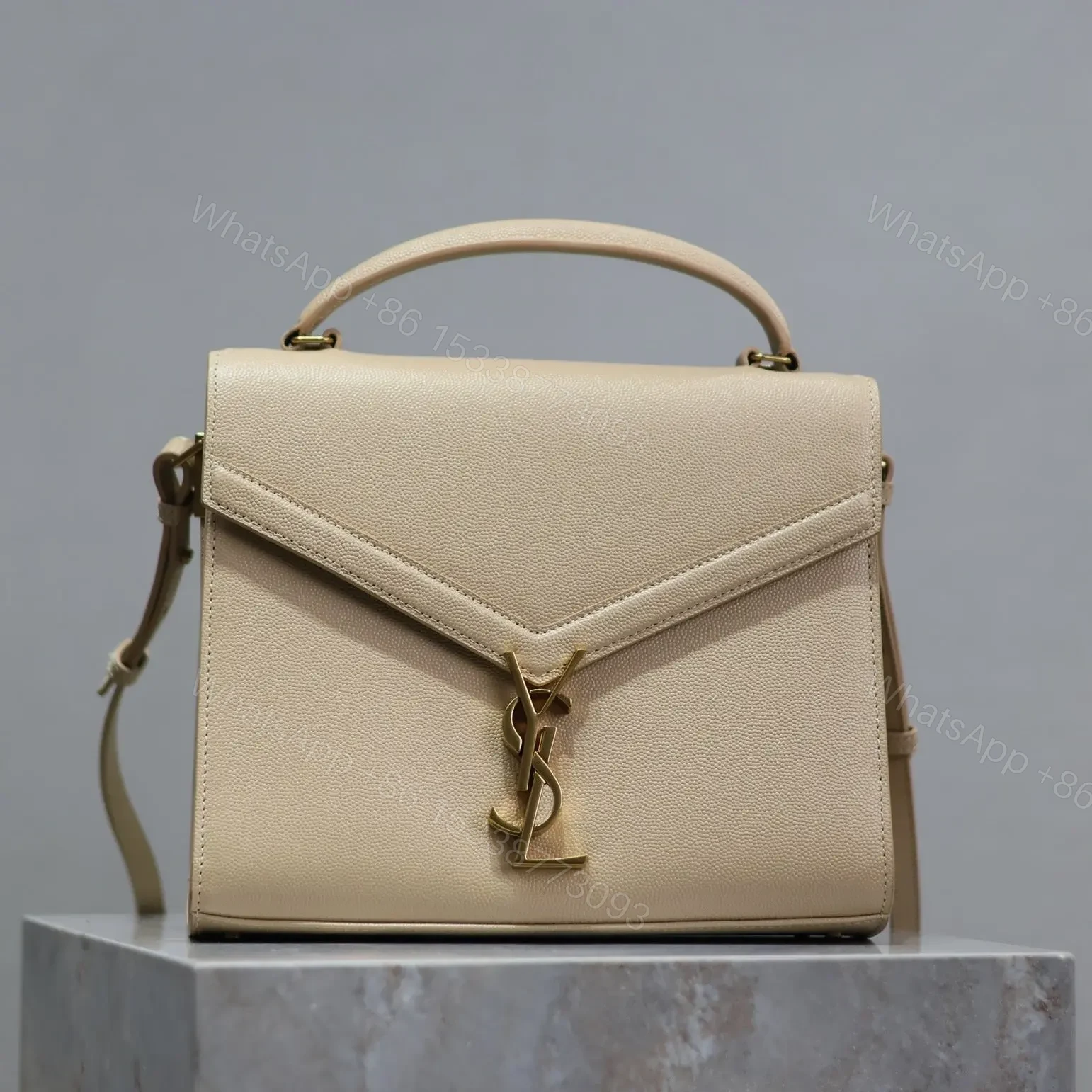 YSL CASSANDRA TOP HANDLE BAG MEDIUM IN BEIGE CALFSKIN GOLD HARDWARE — view 1