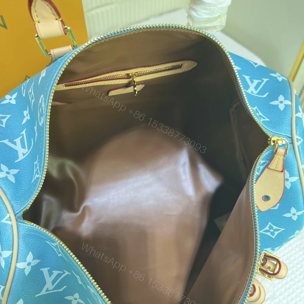 View 8 of Louis Vuitton Speedy P9 Bandoulière 25 Blue 40Cm M24424