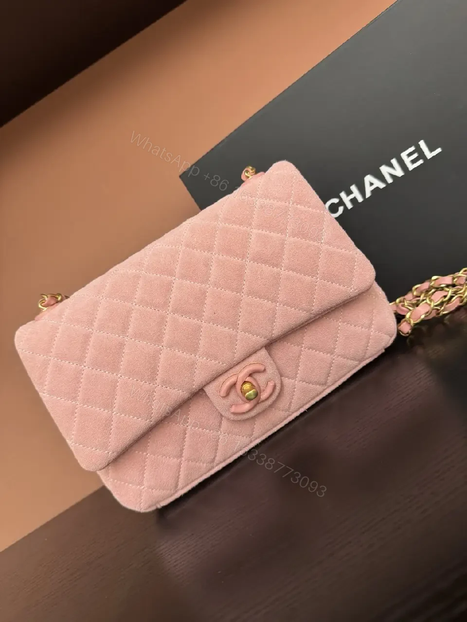 Soft Pink Quilted Shoulder Bag with Gold Lock - Compact Luxury Bag — view 1