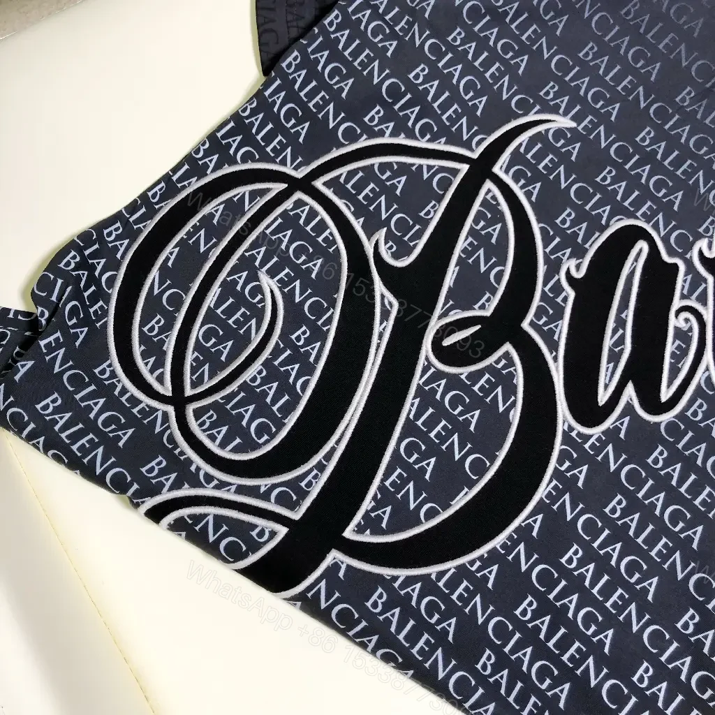 View 4 of Navy Balenciaga Script Graphic T-Shirt shirt