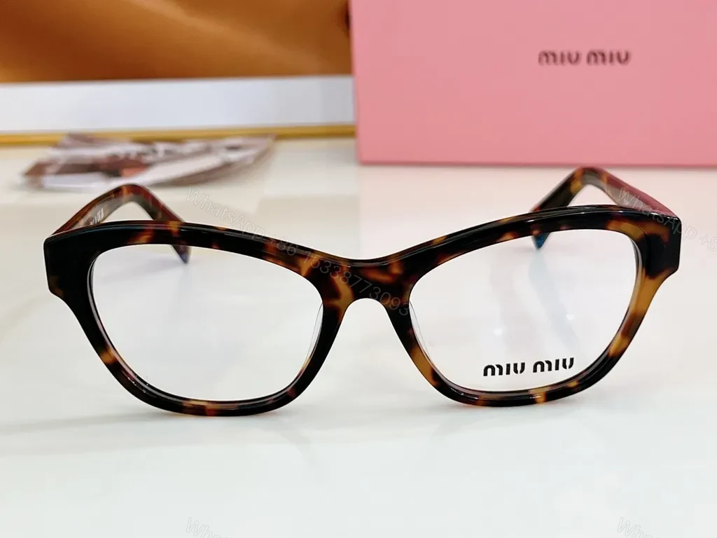 View 8 of Black Acetate Cat-Eye Eyewear â€“ Miu Miu Signature Detail