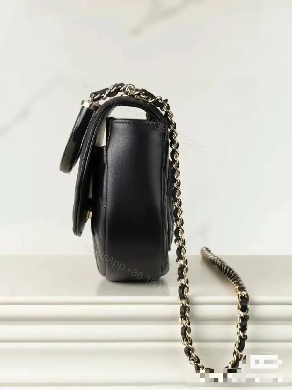 View 5 of Black Faux Leather Quilted Crossbody: Modern Minimalist Chic