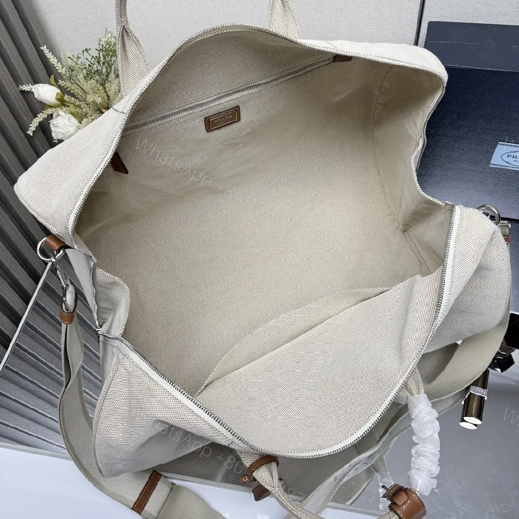 View 9 of Lux Canvas Travel Duffle: Subtle Texture, Maximum Presence