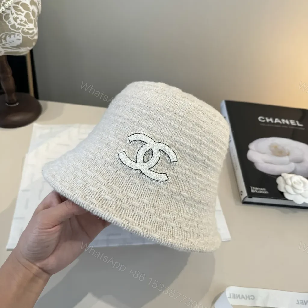 View 2 of Soft-knit White Bucket Hat with Subtle Logo Embroidery