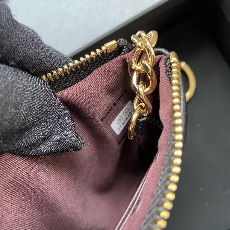 View 9 of Compact Black Quilted Wallet with Gold Chanel Charm â€“ Everyday Luxury